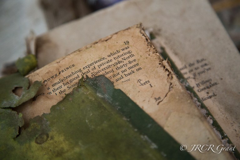 An old book, green cover coming off, found in an abandoned house in Ireland.