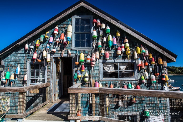 Maine fishing building adorned with colourful fishing floats