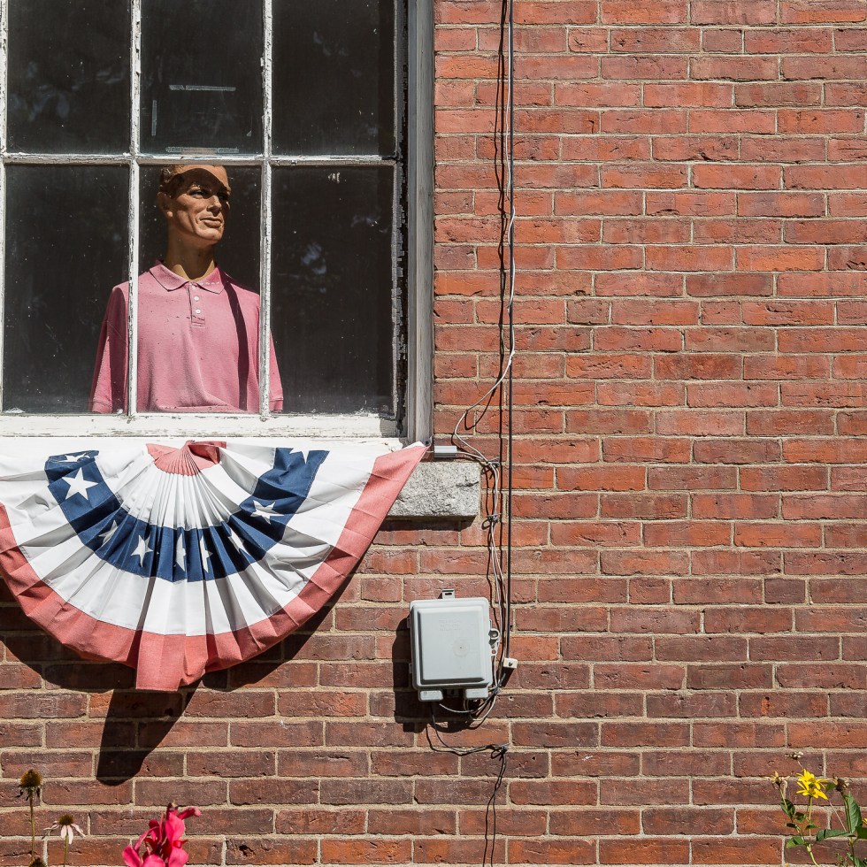 Dummy in Chester, Vermont stares out of a window