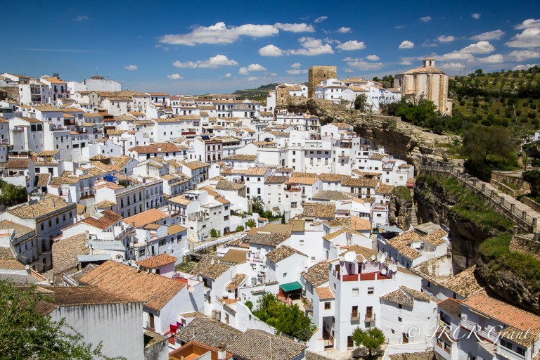 Setenil de las Bodegas crowded into the rocky valley