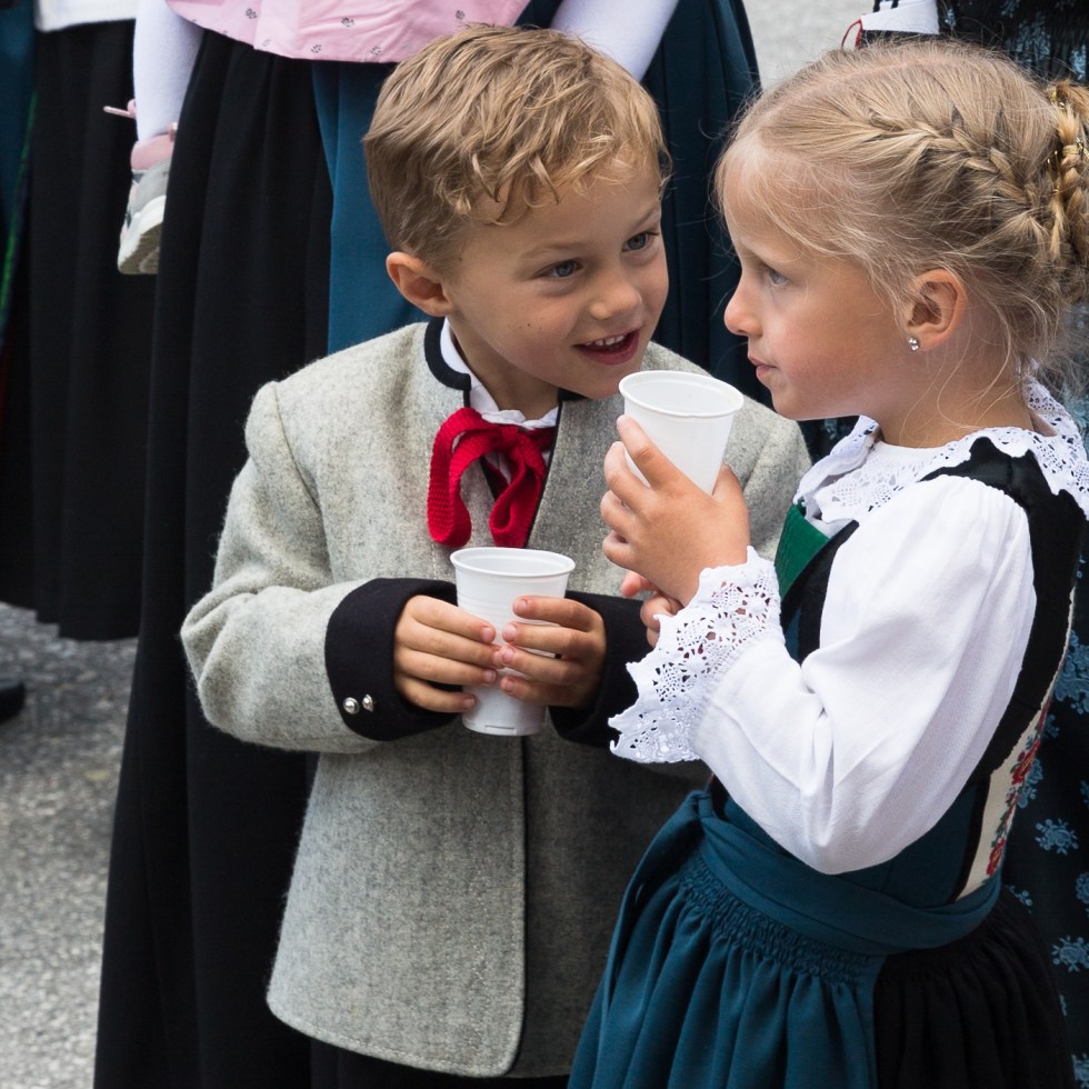 Two young Austrians in traditional dress, Alpbach, Tyrol, Austria