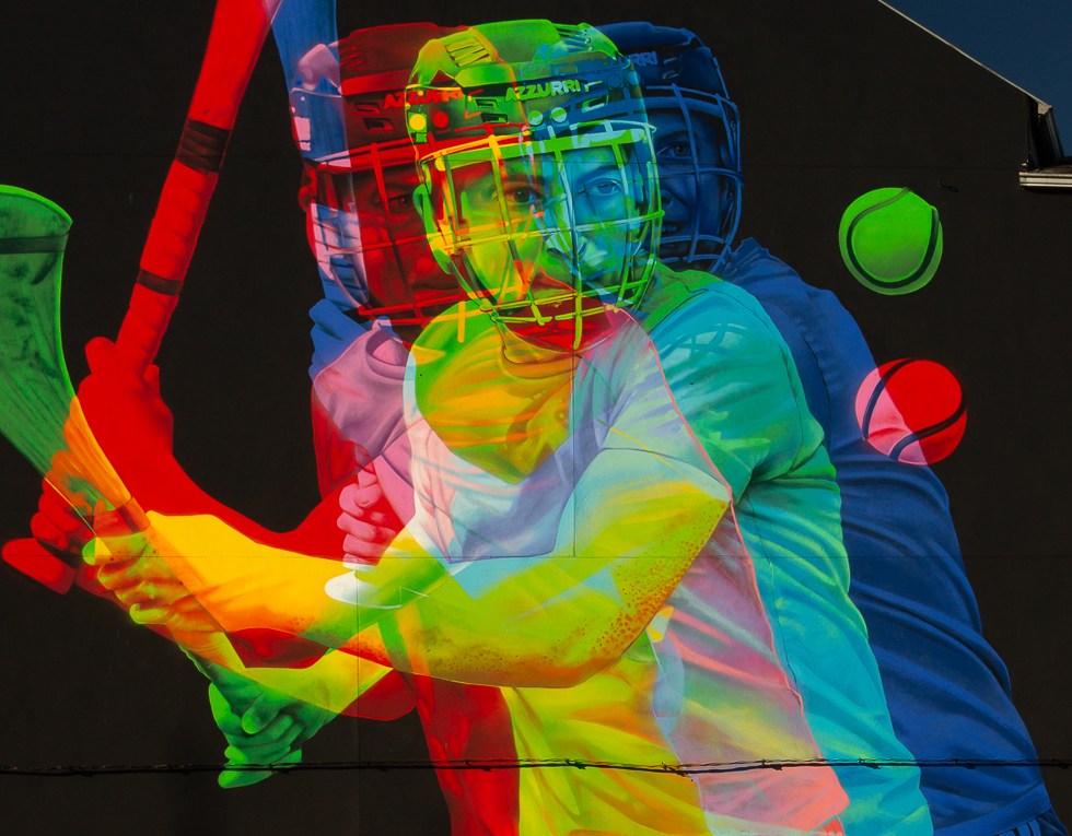 Colourful mural of hurler