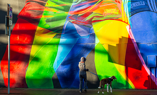 Colourful shorts and passers by