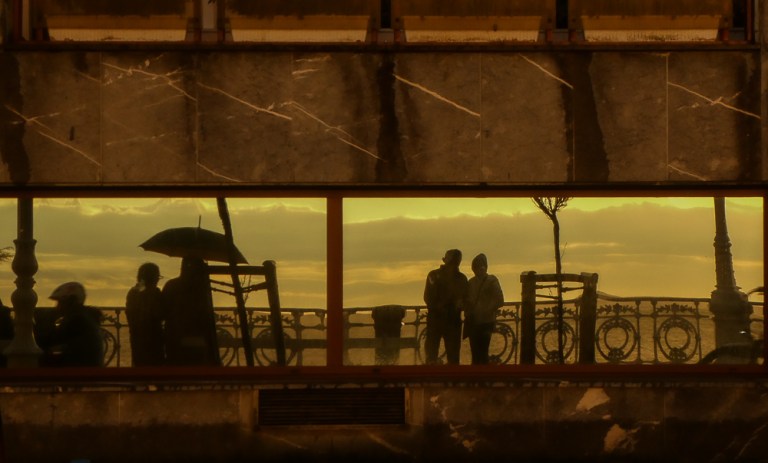 Reflections on a wet promenade