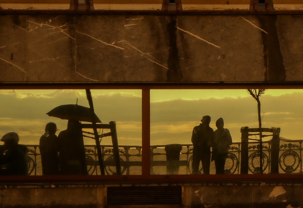 A wet seaside promenade image from San Sebastian