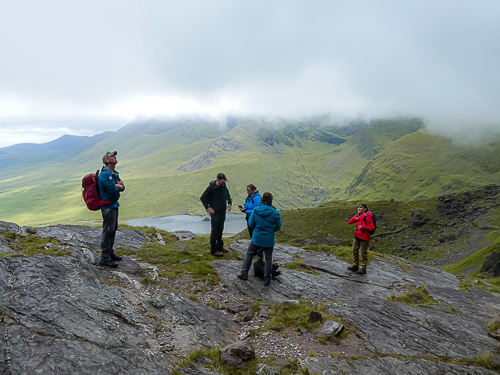 Clouds roll in as the route to Raven's Gully is reviewed