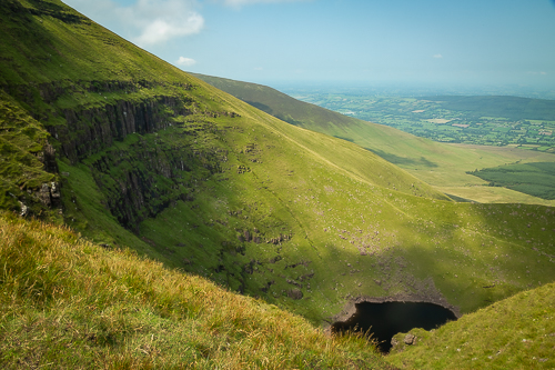 Lough Diheen, nestles in the corrie below the sheer cliffs of Galtymore