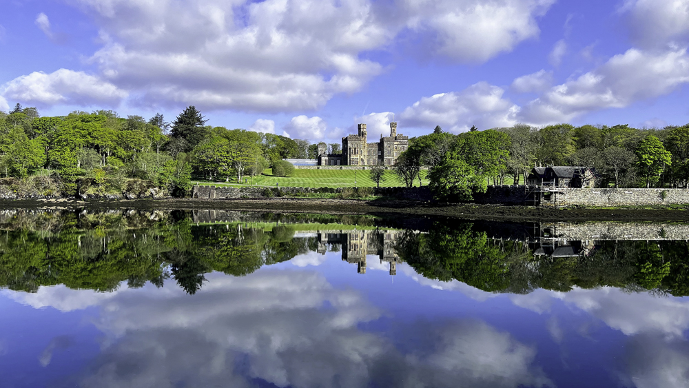 Lews castle stands across the harbour from the town, a manicured lawn providing an expanse of green baize down to the water.