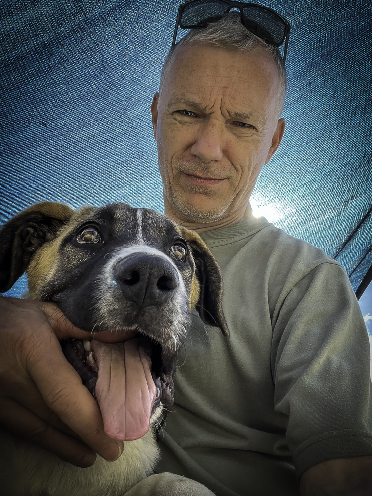 Josie plays with my thumb